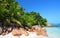 Coast of the tropical island La Digue at Anse Severe beach, Indian ocean, Seychelles.