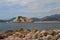 Coastal boulders closeup on a background of the Sveti Stefan