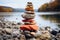 Coastal cairn Stones arranged in a seaside pyramid, a tranquil and natural monument