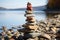 Coastal cairn Stones arranged in a seaside pyramid, a tranquil and natural monument