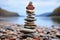 Coastal cairn Stones arranged in a seaside pyramid, a tranquil and natural monument