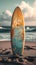 Coastal calmness Surfboard standing tall in the sandy shoreline