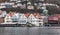 Coastal cityscape of Bergen harbor. Fjord restaurant