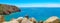 Coastal cliffs in the Atlantic Ocean at Cape Roca in Portugal. Panoramic landscape of Portuguese coast. Picturesque seascape