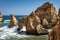 Coastal cliffs and sea stacks near Ponta da Piedate, Lagos, Portugal