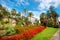 Coastal colorful street with flowers lawn in San Remo. Liguria, Italia