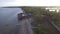 Coastal huts and settlement houses built along sea side. Drone Aerial