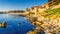 Coastal landscape banner, panorama - embankment with fortress wall in the city of Sozopol