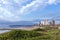 Coastal Landscape Dune Vegetation Beach Sea Against City Skylin