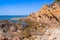 Coastal landscape with empty rocky wild beach