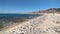 Coastal landscape of La Ventana Bay, stone lined hot springs on the beach, Playa Agua Caliente, BCS, Mexico
