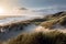Coastal Landscape With Sandy Dunes, Grasses, And Ocean Views. Generative AI