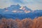 Coastal Mountain Peaks and Aspen Forest in late afternoon sunlight on beautiful winter day.