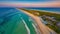 Coastal Paradise: Aerial View of Beach with Turquoise Waters