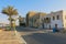 Coastal promenade in the ancient city of Quseir in Egypt. Landmark in photo is a historic building built of sea corals. Old Road.