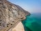 Coastal road and seaside in Musandam Governorate of Oman aerial