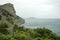 Coastal rocks. Coniferous trees on the rocky coast. Rocky coast. The Golitsyn Trail. Crimea.