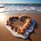 Coastal sentiment Heart drawn on beach sand, embraced by rolling wave backdrop