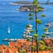 Coastal summer landscape - view of the City Harbour of the town of Hvar and Paklinski Islands