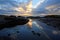 Coastal tide pool sunset reflection, Oregon coast