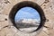 Coastal town Essaouira through a rampart hole.