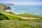 Coastal trail on the green bluffs of Pacific Ocean, Mori Point, Pacifica, California