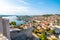 Coastal view of Sibenik old city, Croatia. Cathedral of St James, adriatic sea with island in background. Summer weather, aerial
