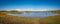 Coastal wetlands lake on bright sunny day.