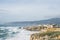 Coastline with atlantic ocean in Cascais, Portugal. Waves at the shore and rocky hills