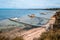 Coastline with beautiful wooden piers and sheds.