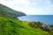 Coastline with green grass in Douglas, Isle of Man