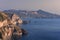 Coastline of island Lipari with view to volcan island Vulcano during sunset, Sicily Italy