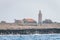 Coastline with a lighthouse and outbuildings on the coast in Cyprus