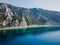 Coastline with ocean and highest cliff with trees. Aerial view