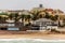 Coastline, palms and old blocks of Swakopmund German colonial to