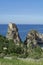 Coastline with rocks and deep blue sea near Castellamare del Golfo by entrance to natural reserve Zingaro, Sicily, Italy