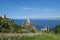 Coastline with rocks and deep blue sea near Castellamare del Golfo by entrance to natural reserve Zingaro, Sicily, Italy