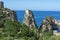 Coastline with rocks and deep blue sea near Castellamare del Golfo by entrance to natural reserve Zingaro, Sicily, Italy