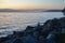 Coastline seawall made of large stacked boulders