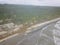 The coastline taken with a drone shows beach waves