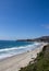 Coastline view of the ocean landscape from the hillside. Peaceful, sunny day holiday destination