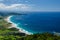 Coastline view from the top of Te Whara Track with blue sky above in Whangarei Heads, Northland, New Zealand