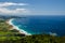 Coastline view from the top of Te Whara Track with blue sky above in Whangarei Heads, Northland, New Zealand