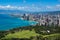 The coastline of Waikiki Beach leading into Waikiki and Honolulu