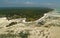 Coastline in Zanzibar, Tanzania, with the seaweed farms, landscape with the local sea farms during low and high tide, shallows on