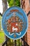 Coat of arms of bishops and canons on the entrance gate. Frombork, Poland