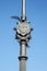 Coat of arms of City of Barcelona, Spain, made of iron and filled with florid elements. This ornament decorates some street lamp