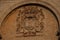 Coat of arms close-up. Fragment of the building. Merida San Ildefonso cathedral. Yucatan. Mexico