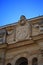 Coat of arms of Cuba on the facade of the building of the Spanish Embassy, close-up. Old Havana area. Havana, Cuba