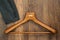 Coat hanger with suit on wood board laundry shop business concept.